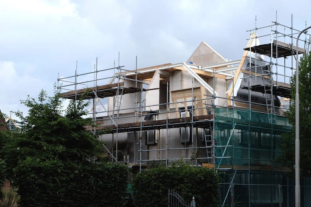 New house under construction with scaffolding